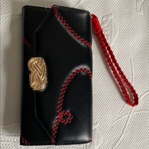 Elegant Black and Red Women's Clutch K.E. Antilock clutch